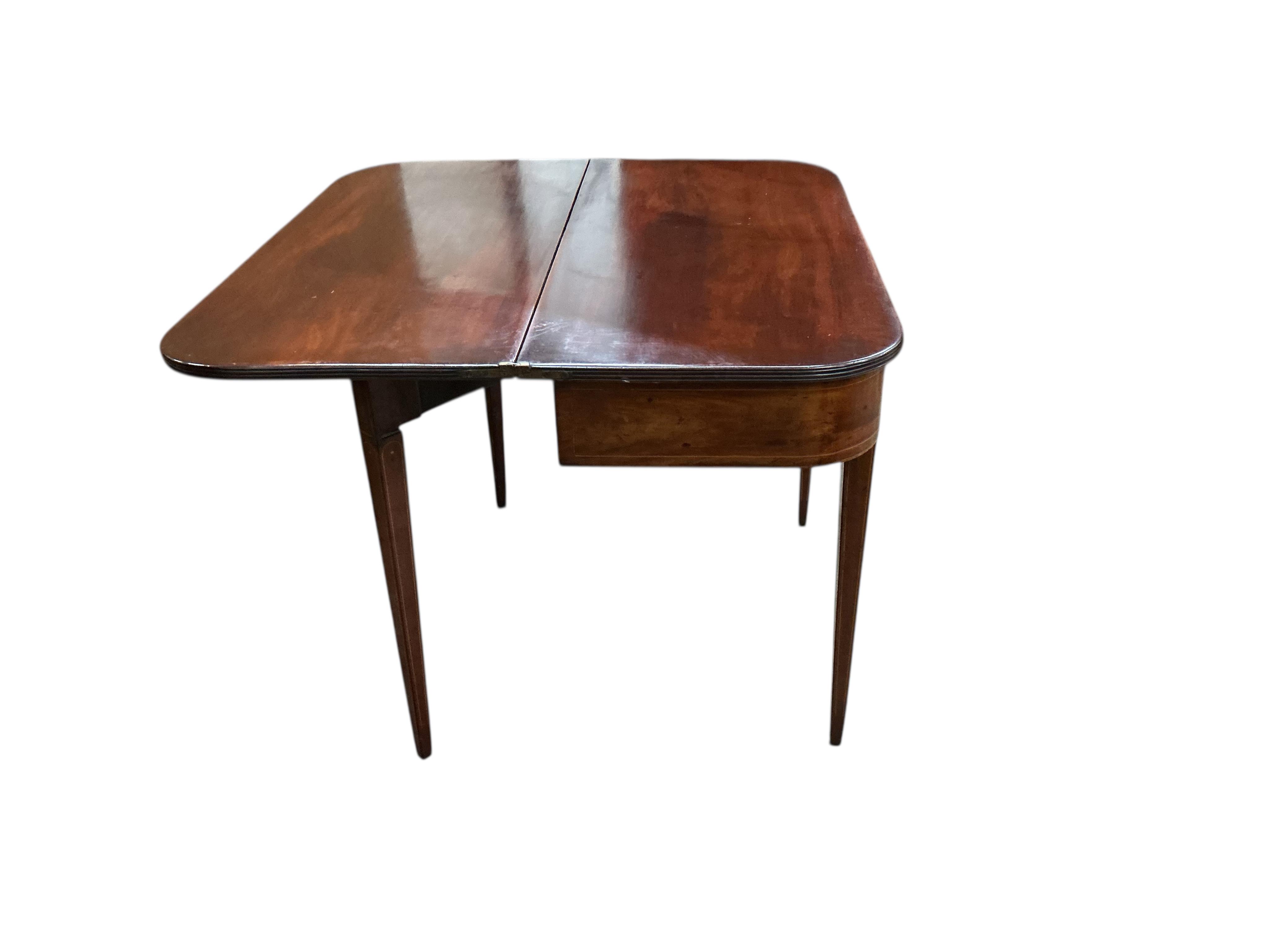 A George III mahogany D shaped folding tea table, width 97cm, depth 46cm, height 75cm
